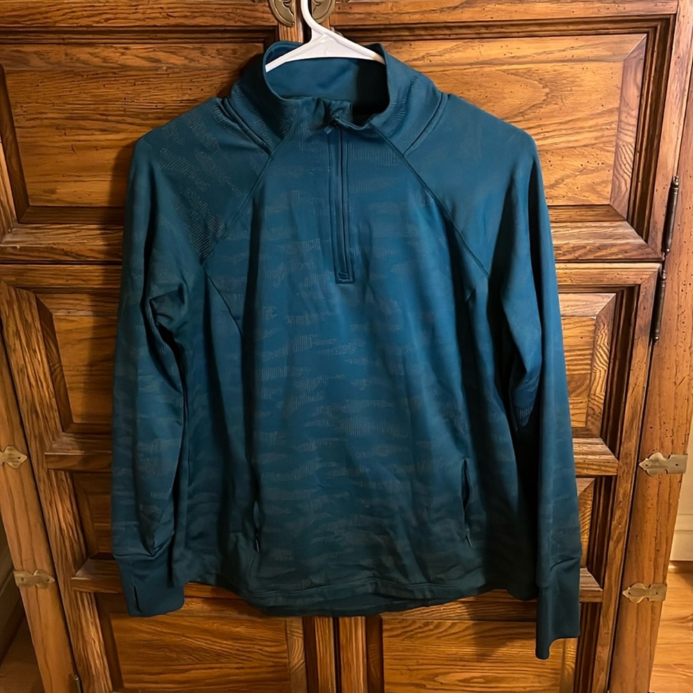 Teal zip up size medium.